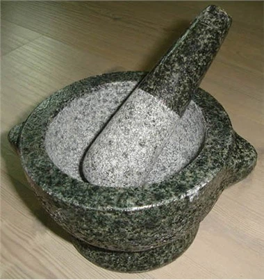 هاون و دستکش از سنگ